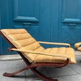 Paire de fauteuils pliants en cuir palissandre
