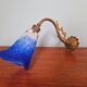Wall light in gilded bronze and blue marmoreal glass, early 20th century