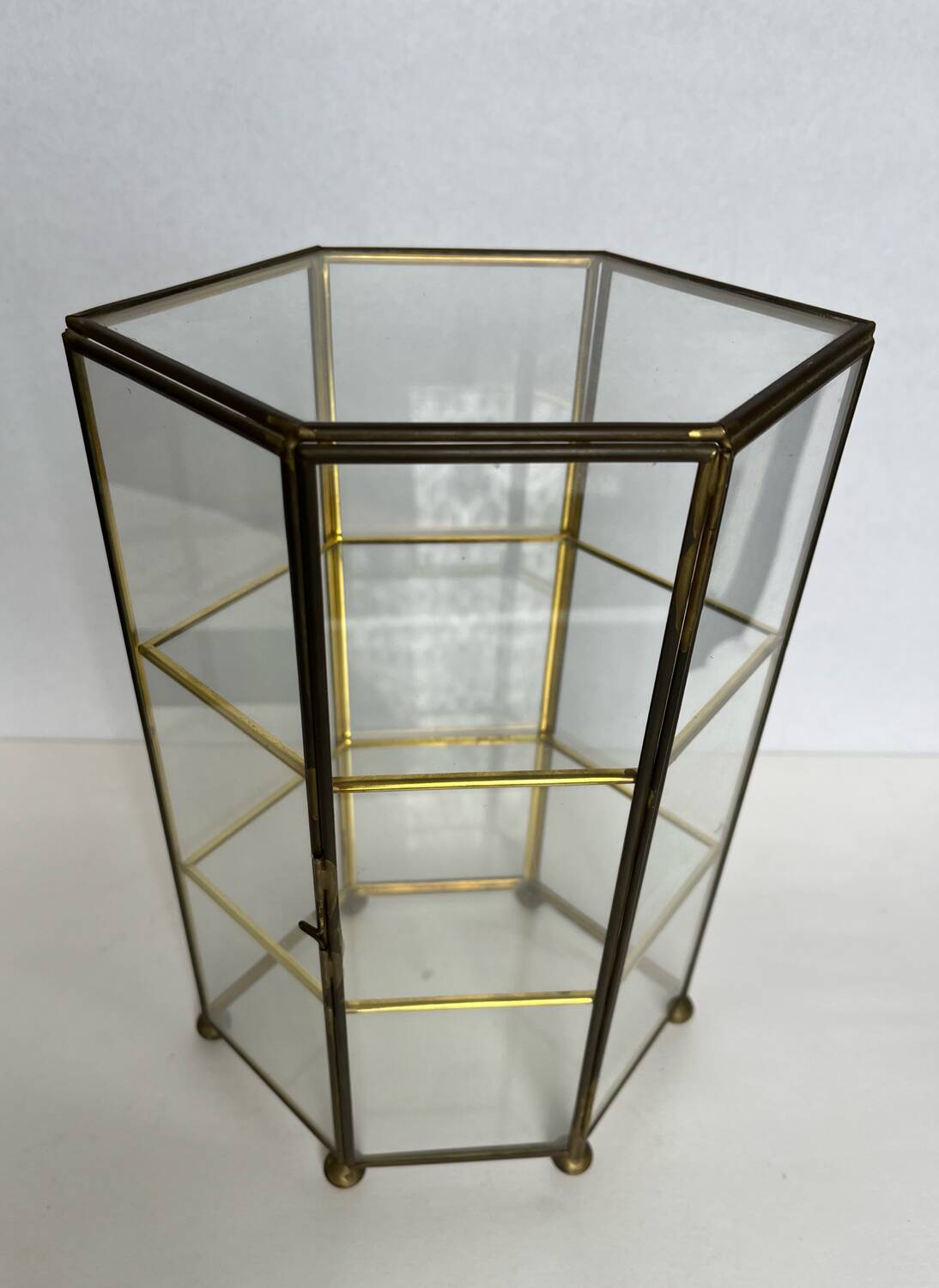 Small glass shelf on feet