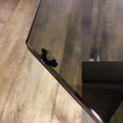 Brushed stainless steel design side table and 70s smoked glass