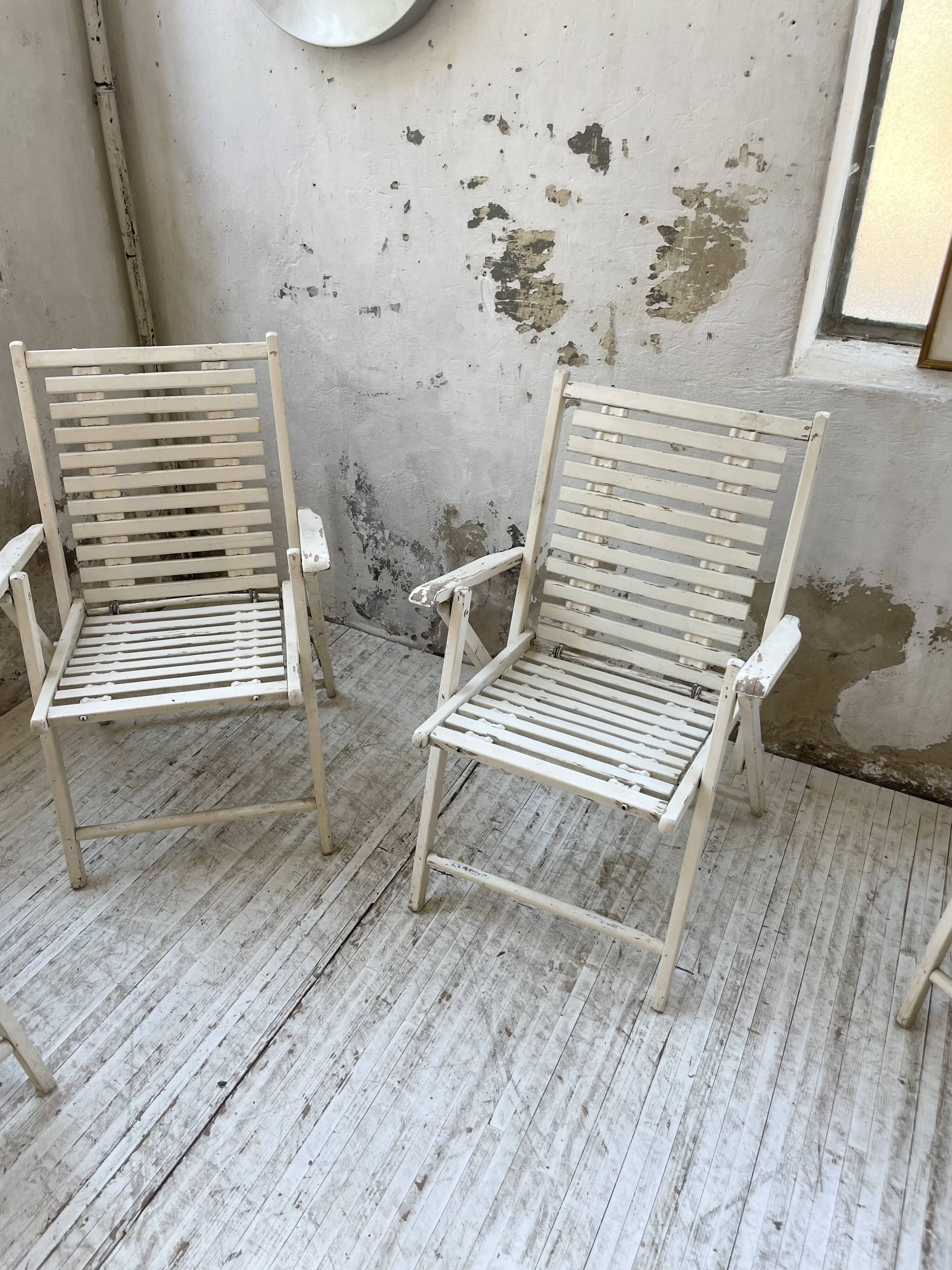 4 white wooden garden chairs