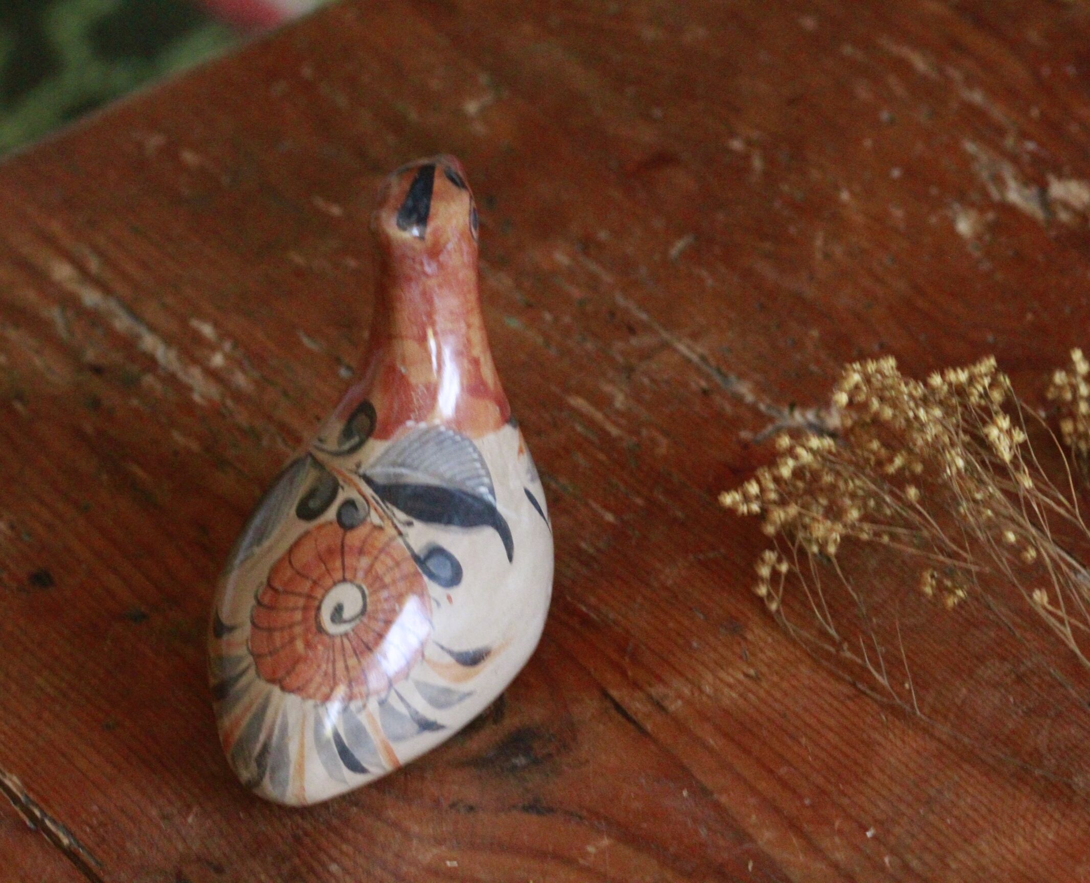 Ancient Mexican bird statue in ceramic