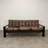 Salon canapé et fauteuils brutalistes, cuir et bois, années 70