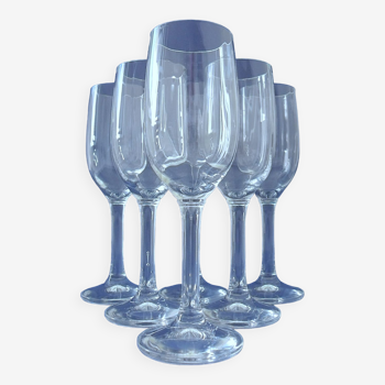Suite of six champagne flutes in colorless crystal