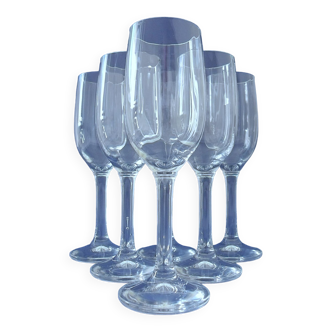Suite of six champagne flutes in colorless crystal