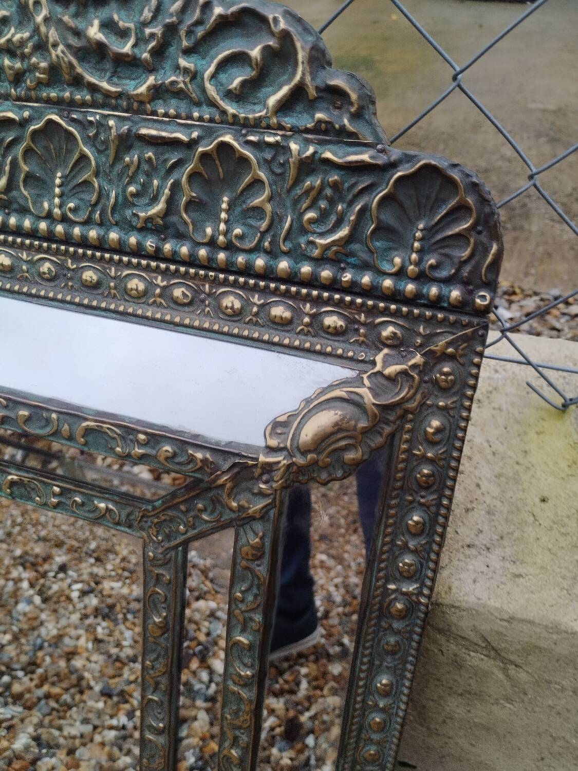 Antique mirror with copper moulding.