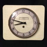 Wall clock with formica key