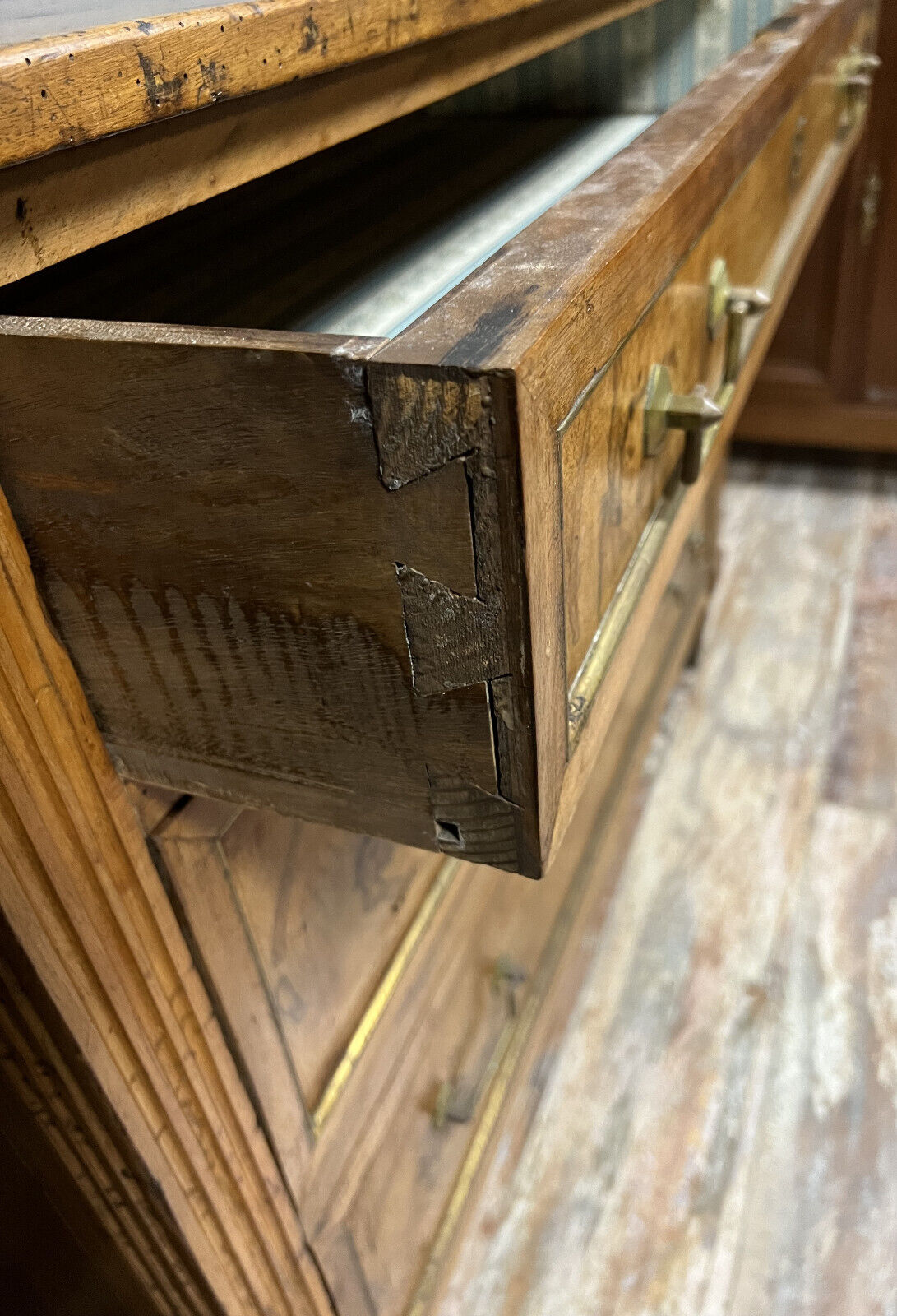 Louis XVI period chest of drawers in walnut and gilded brass nets circa 1780