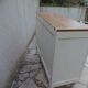 Vintage beige sideboard with oak top.