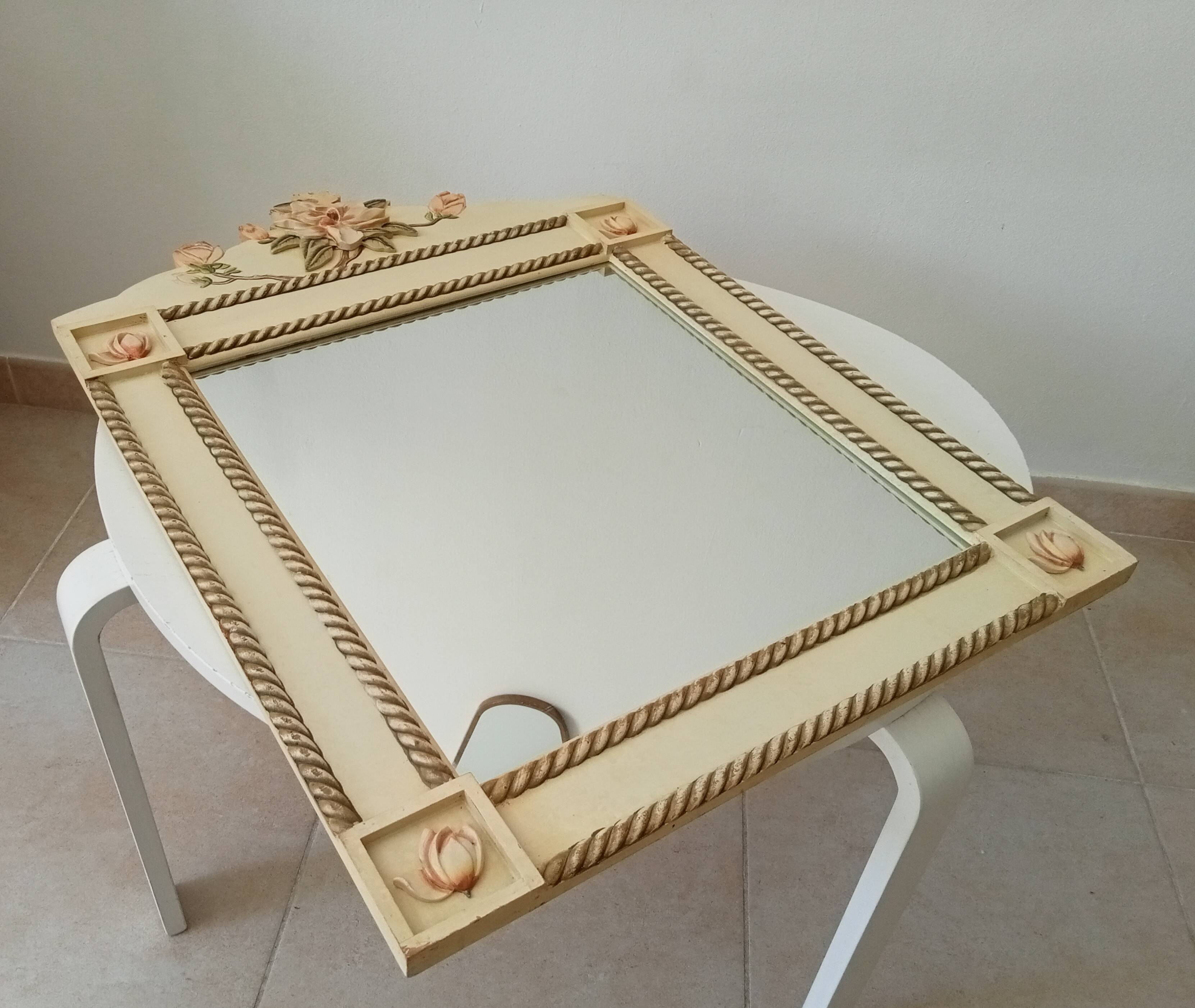 Vintage bohemian mirror from the 80s in carved wood.