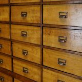 School cabinet bank of vintage Dutch drawers in mid-twentieth century pine