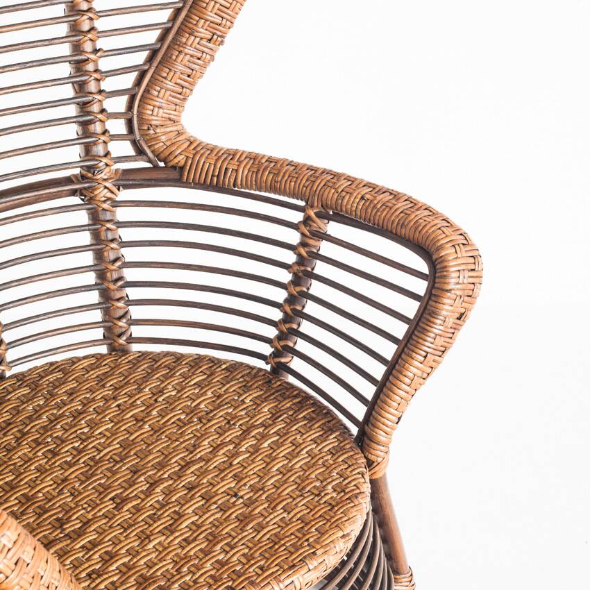 Vintage high armchair in cane/rattan. France, 1960s