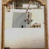 Louis XV style mirror in wood and gilded and patinated stucco 19th century