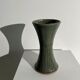 Dark green handcrafted vase with glazed ceramic grass blades