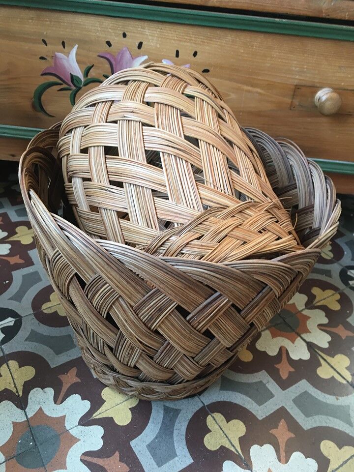 Two matching wicker pot covers