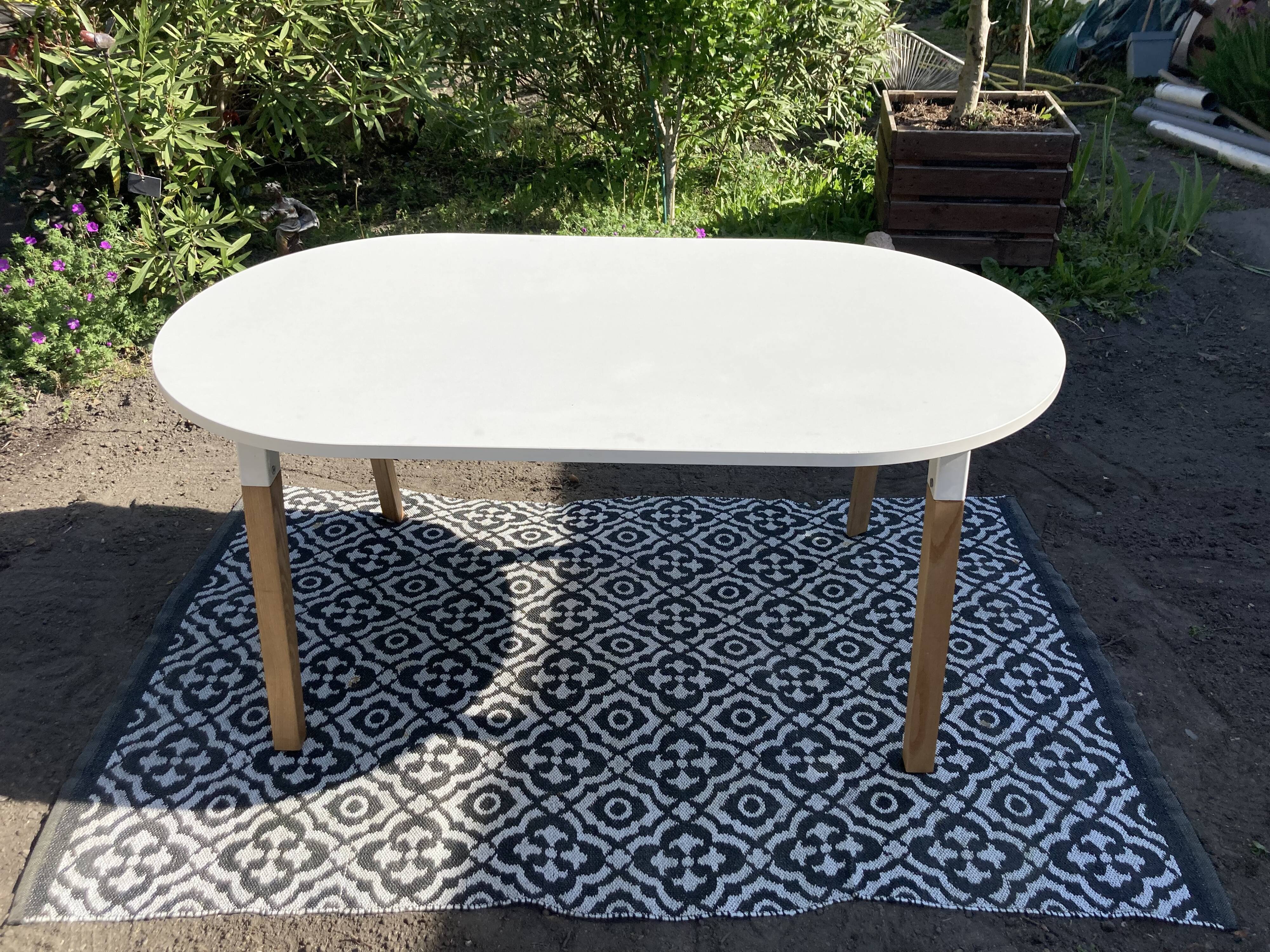 White oval table solid wood base
