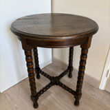 Antique turned wooden side table with authentic charm.