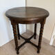 Antique turned wooden side table with authentic charm.