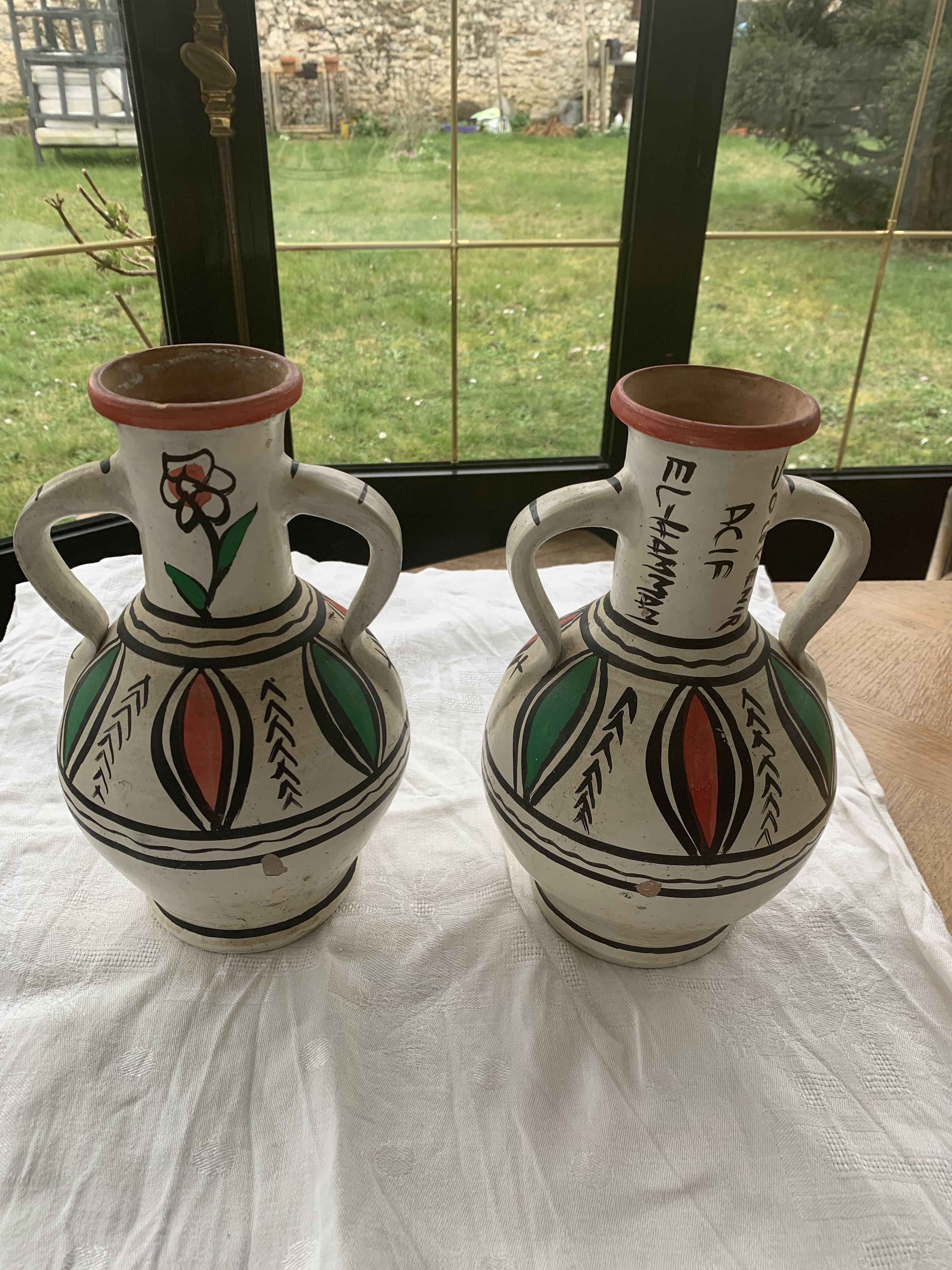 Pair of amphora vase, vintage artisanal and oriental pottery