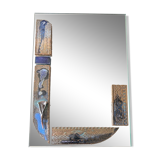 Mirror with ceramic inclusion