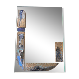 Mirror with ceramic inclusion