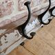 Solid teak coat hook with 4 double cast iron hooks