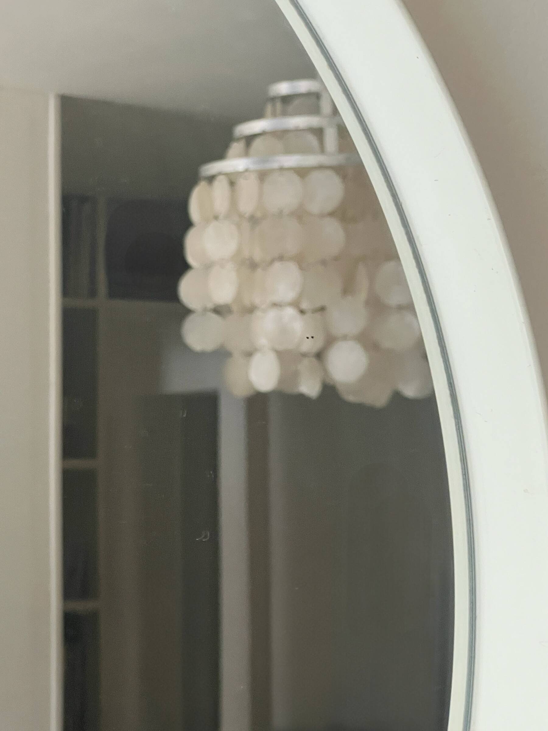 Large round white mirror space age design from around 1970.