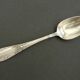 Set of 11 SFAM silver metal teaspoons.