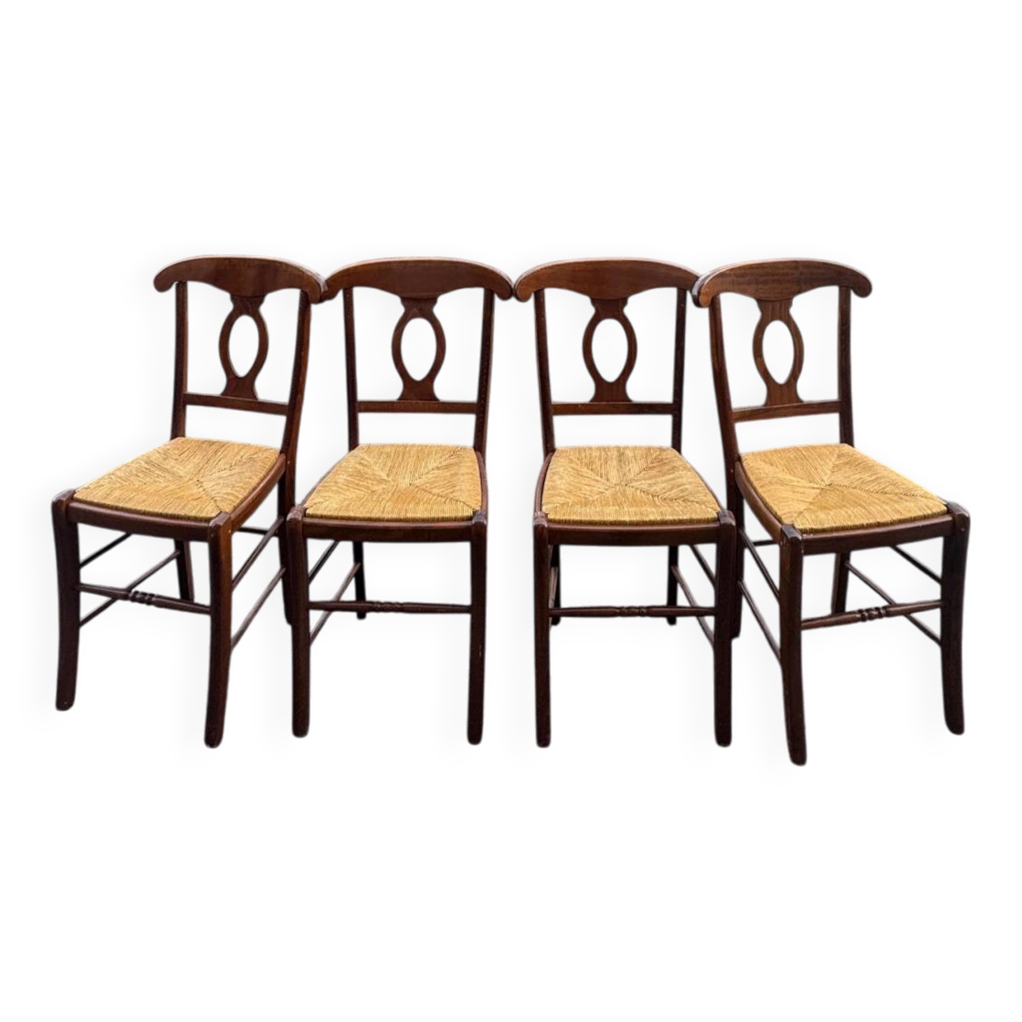 4 straw-seated chairs