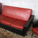 3-seater sofa and 2 rockabilly chairs in red and black skai
