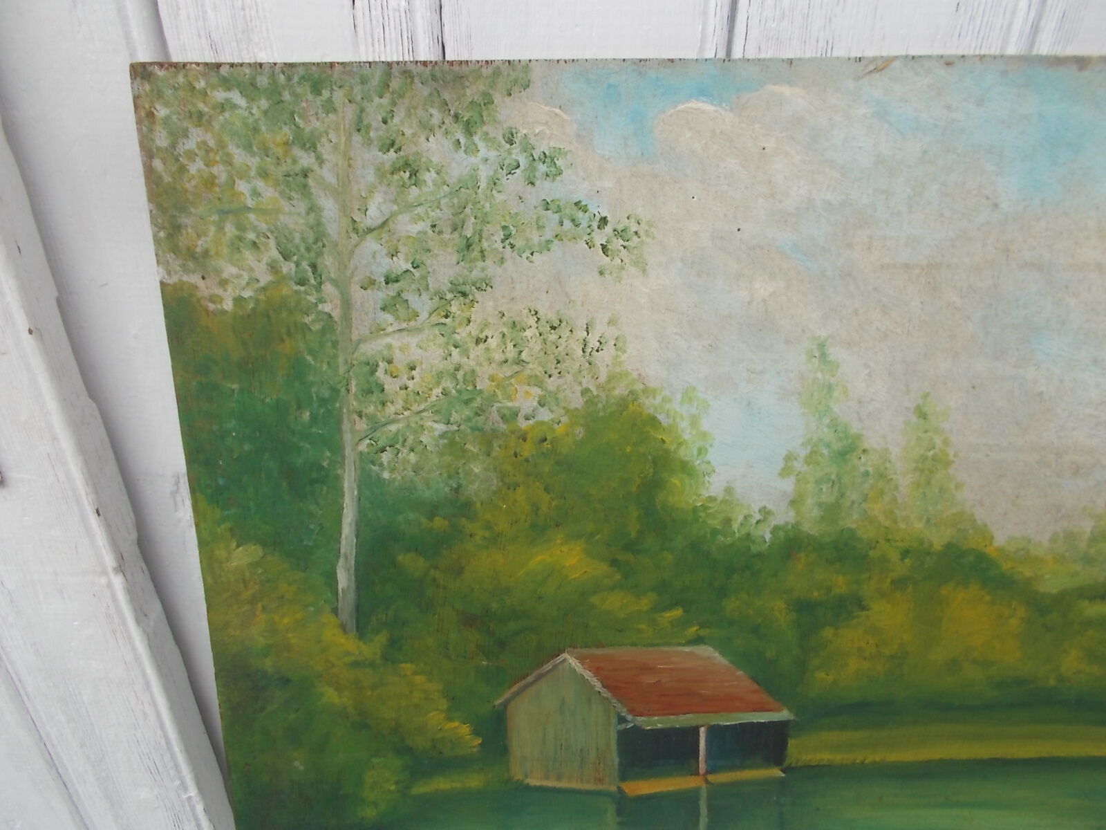 Tableau of a bouquet of flowers on a double-sided wooden panel.