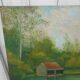 Tableau of a bouquet of flowers on a double-sided wooden panel.