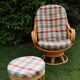Swivel rattan armchair with matching ottoman