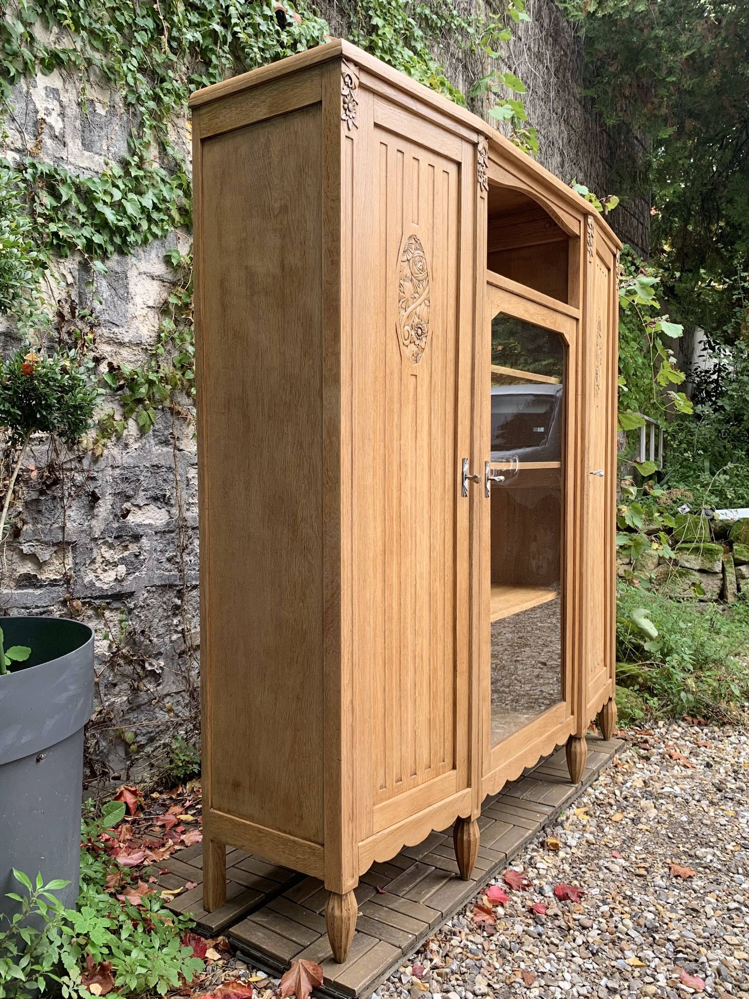 Asymmetrical Art Deco glass-fronted Parisian wardrobe in raw oak, 1930.