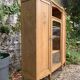 Asymmetrical Art Deco glass-fronted Parisian wardrobe in raw oak, 1930.