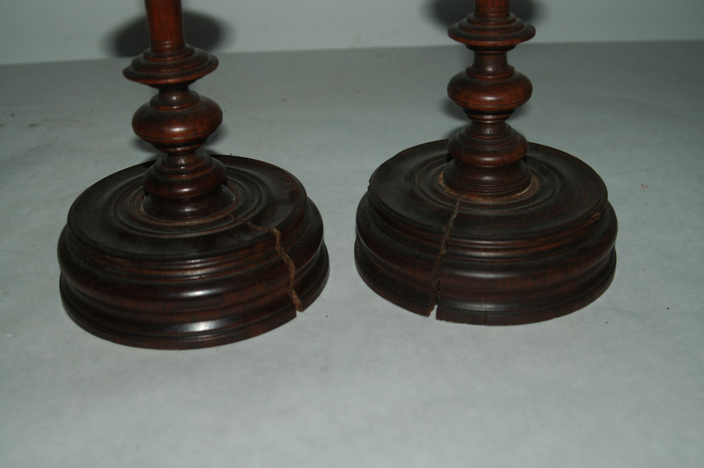 Pair of mahogany turned wood candlesticks