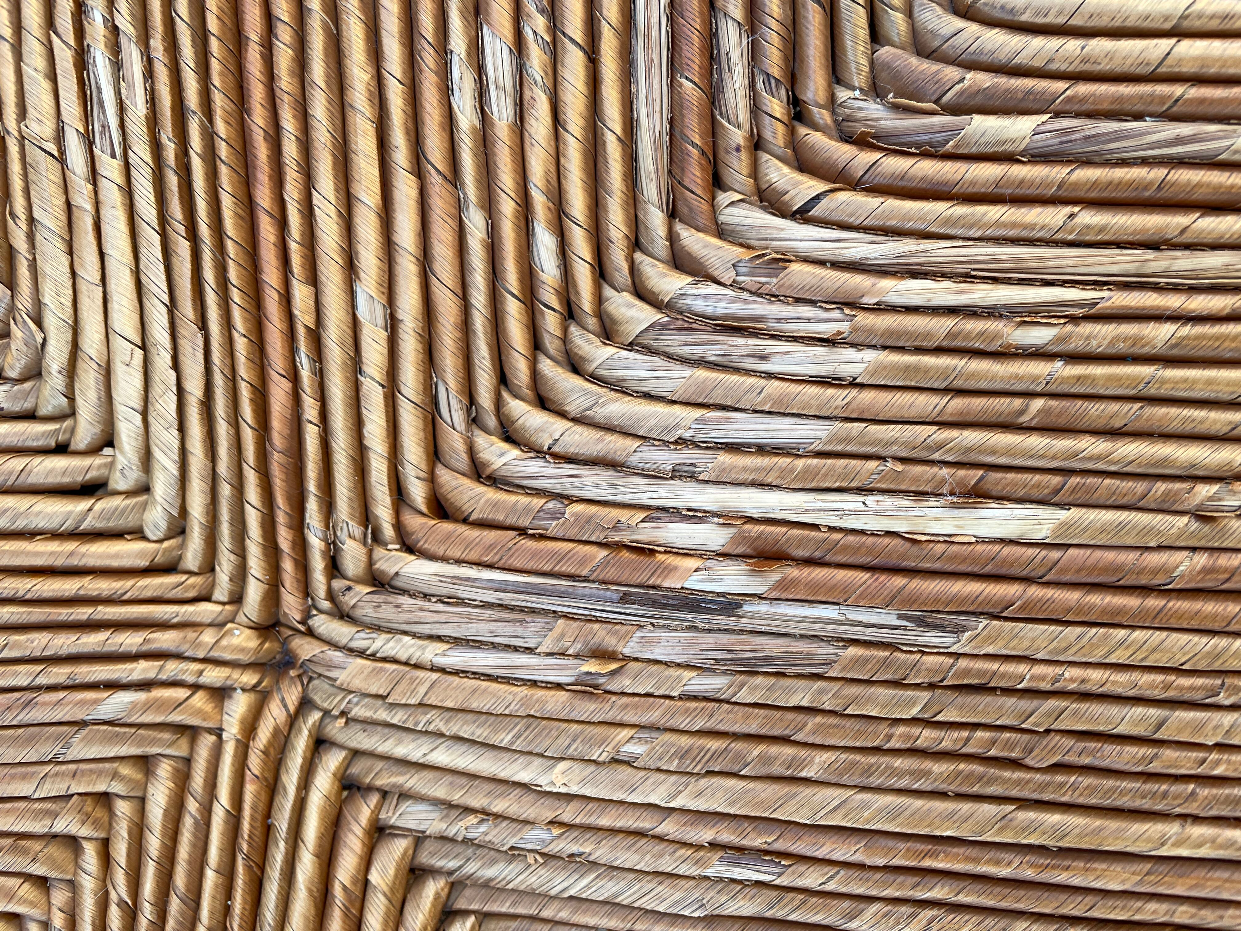 Vintage armchair in straw and brutalist wood