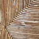 Vintage armchair in straw and brutalist wood