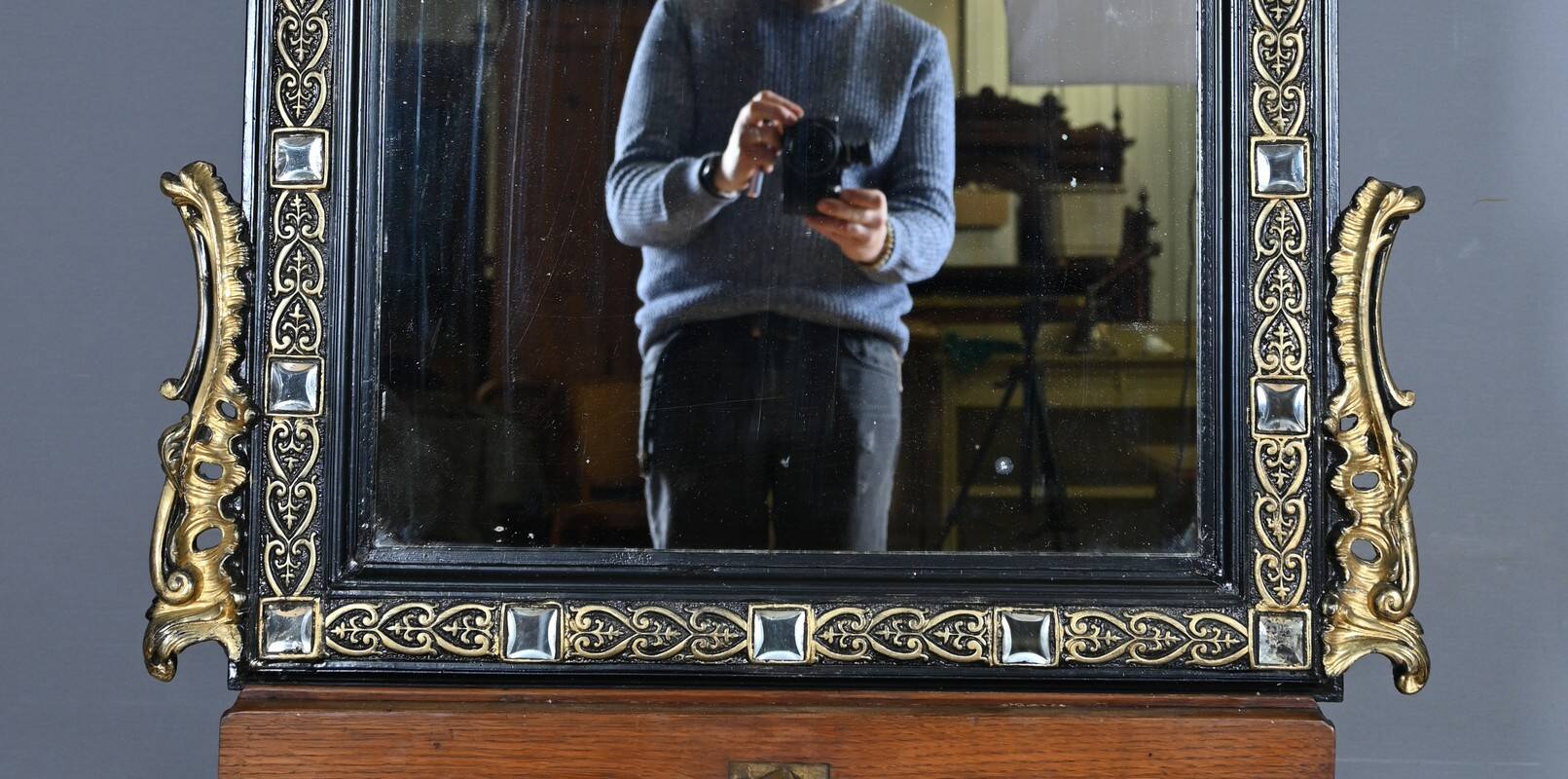 Black and gold Napoleon III mirror, 19th century, 115x86cm