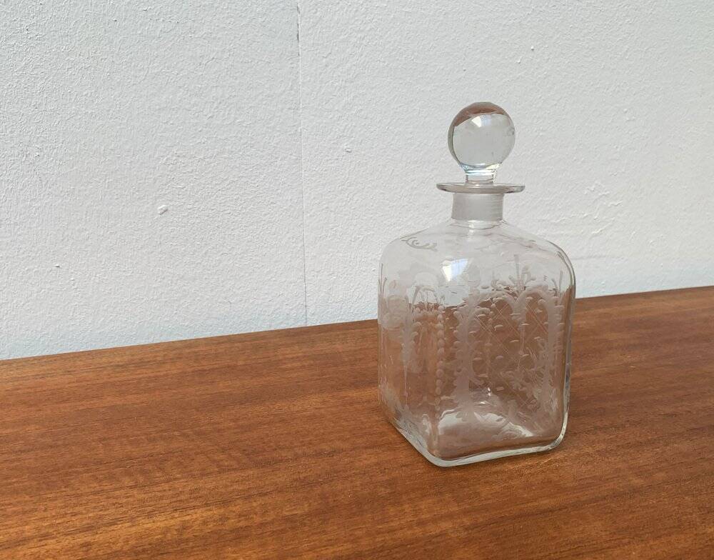 Vintage Danish glass bottle with engraving.