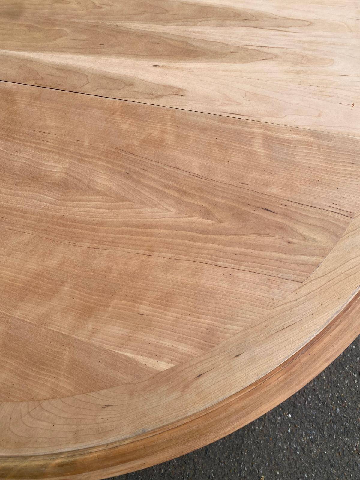 Round extendable farmhouse dining table, stripped, Louis XIII style from the 1960s.