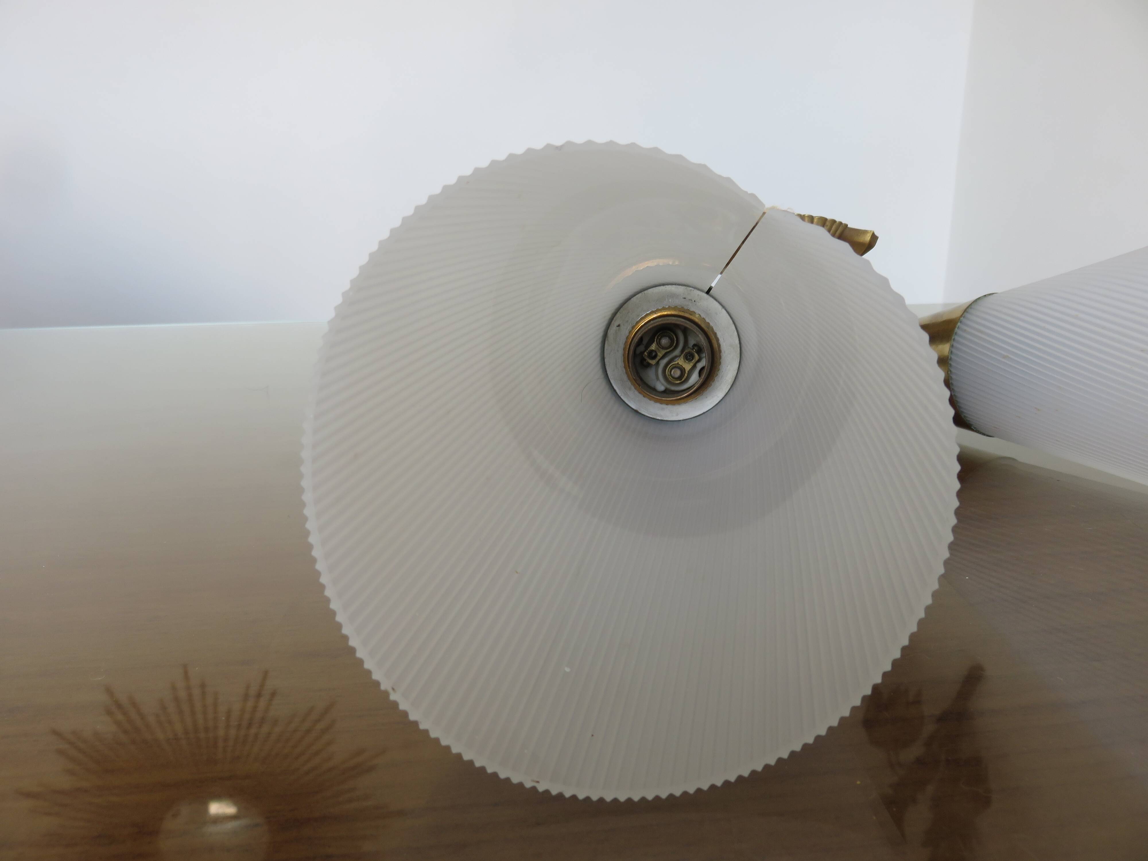 Double wall light in perspex and gold metal from the 50s and 60s.