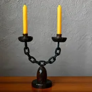 Sculpted wooden and wrought iron brutalist double chandelier from the 1960s.