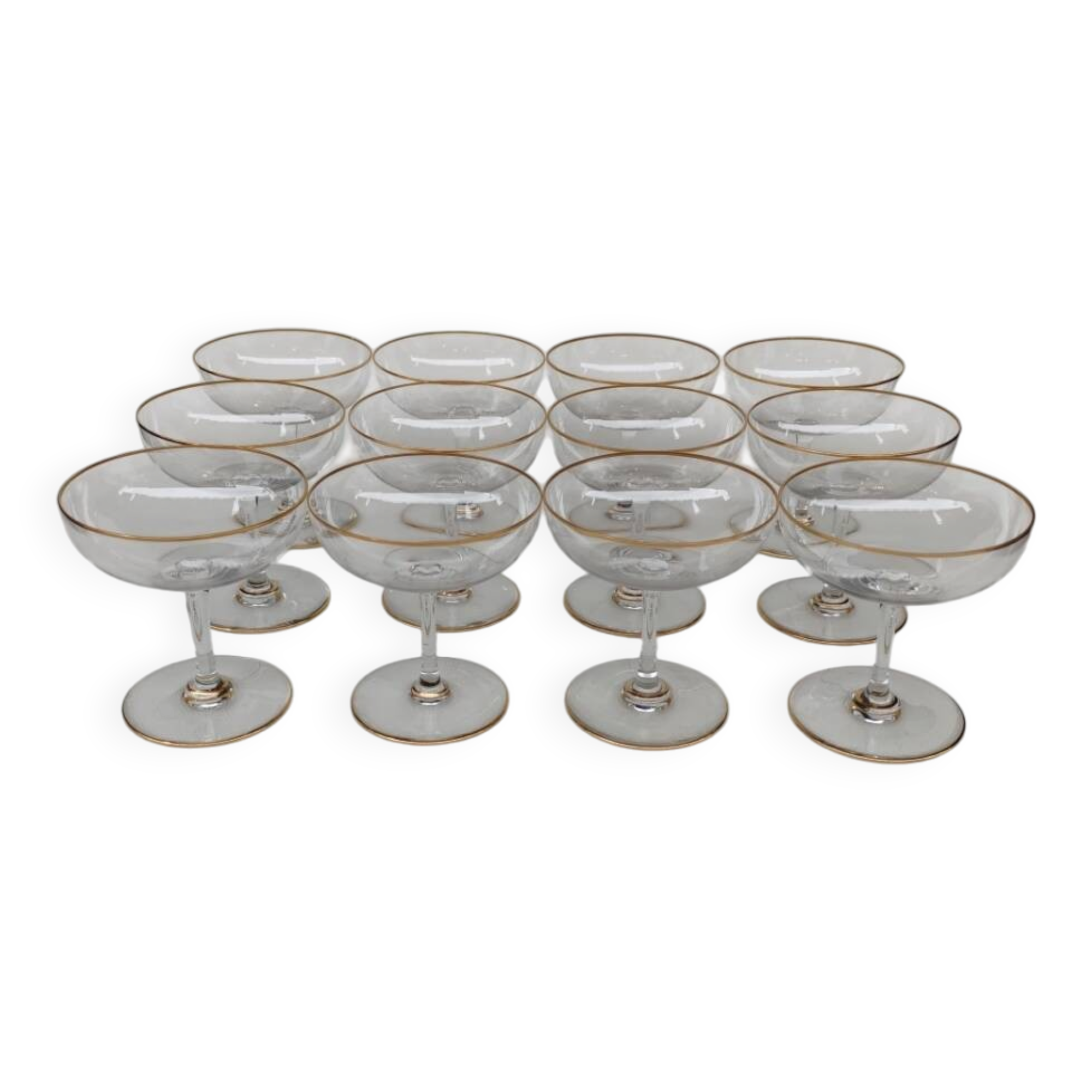 12 Baccarat crystal champagne coupes, circa 1900.