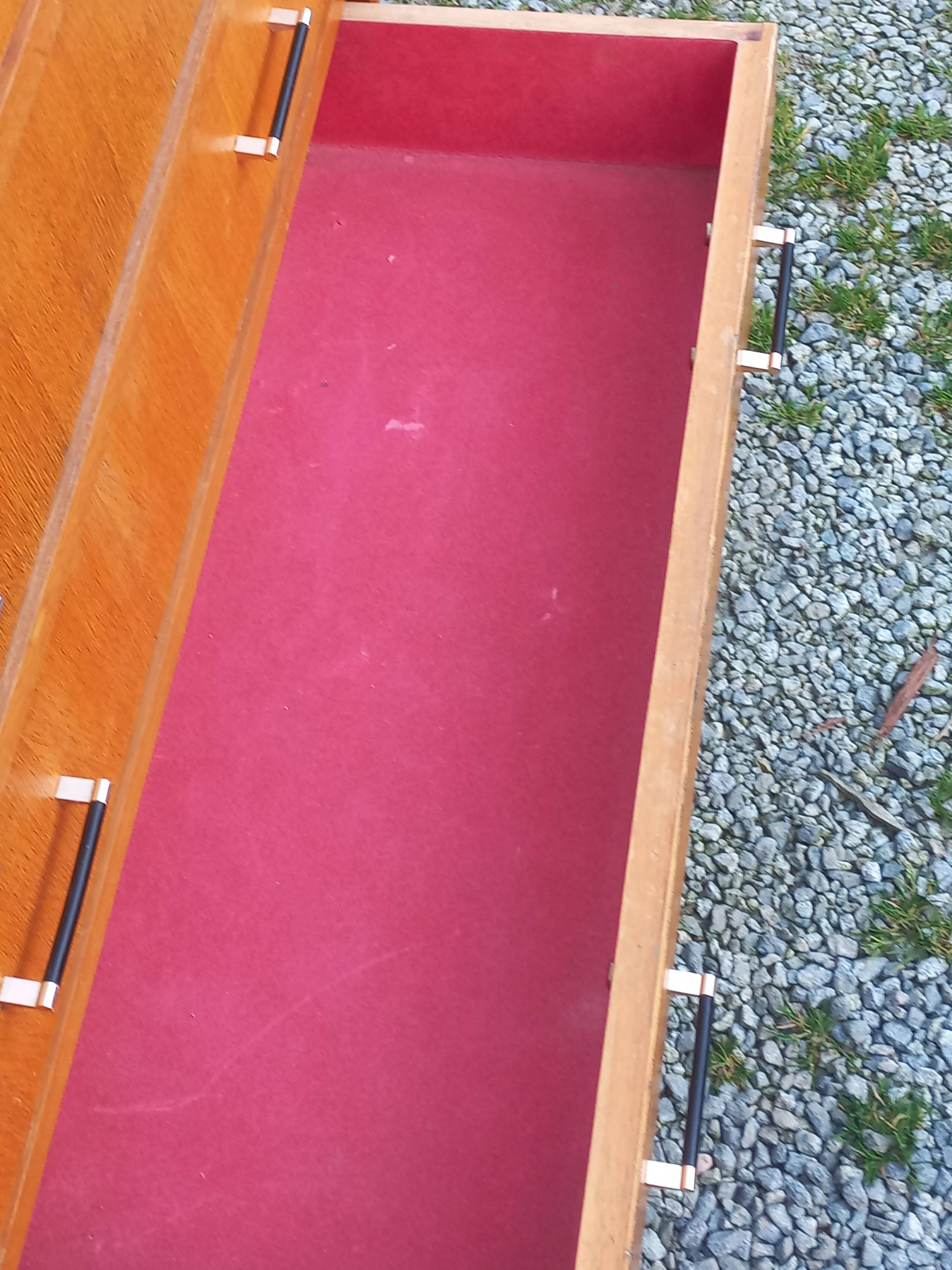 Vintage oak commode with tapered legs and wings from the 1950s.
