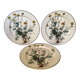 Set of three flat plates with botanical flowers by Villeroy & Boch.