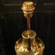 Pair of lamps in gilded brass