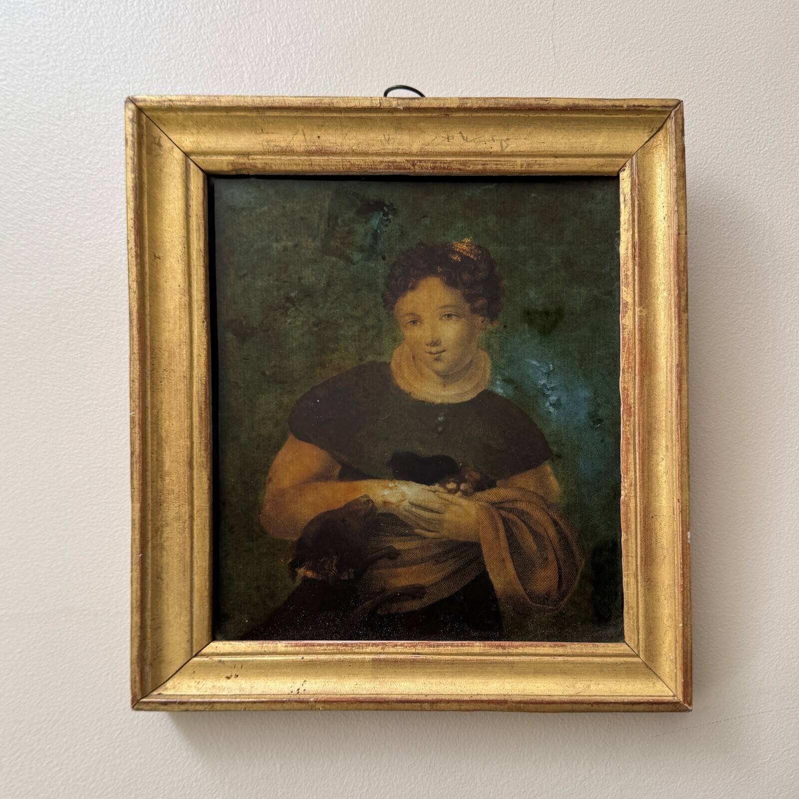 Portrait of a young girl, 18th century, fixed under glass in a baguette frame