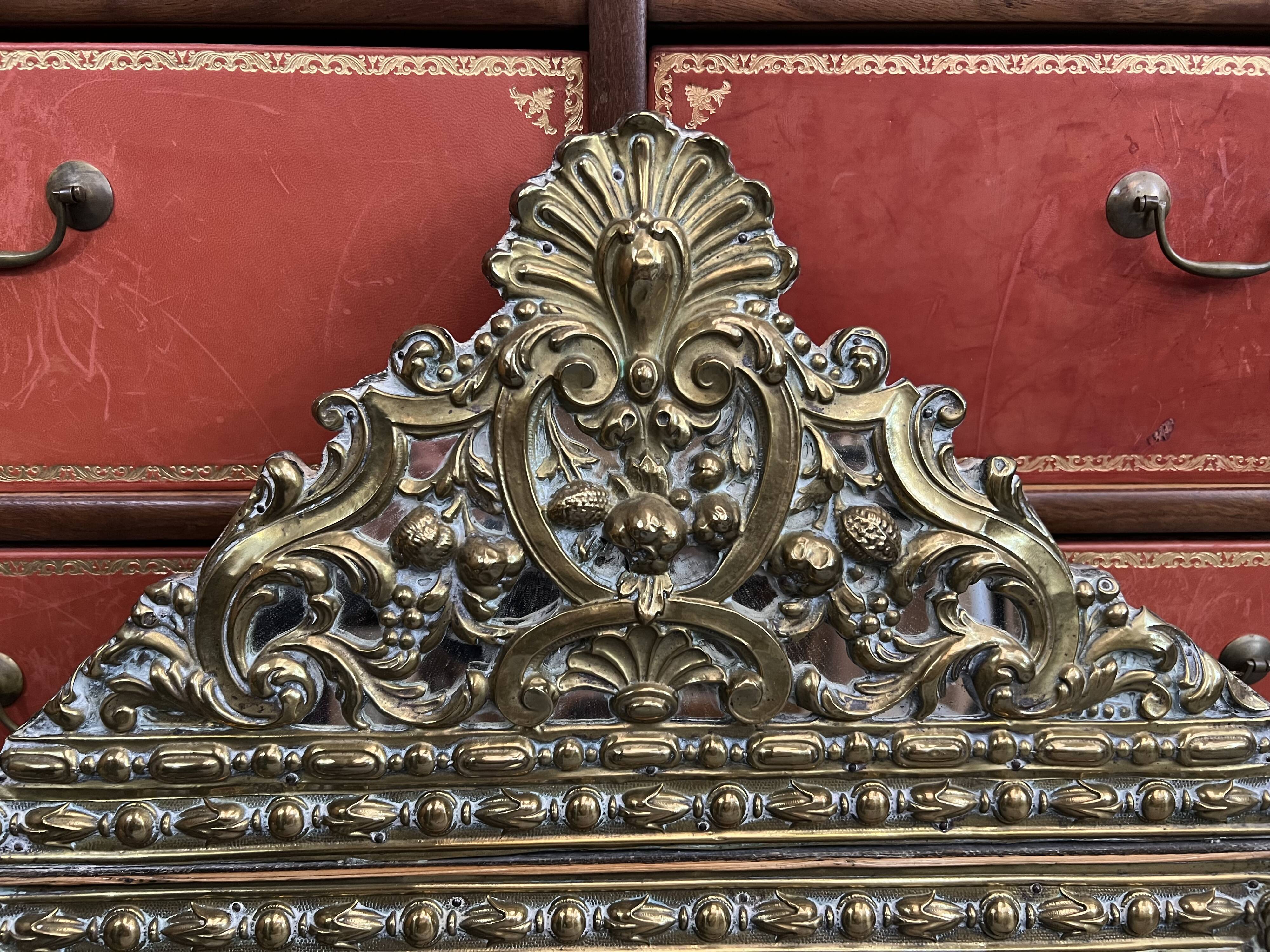 Old repoussé brass pareclose mirror