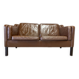Scandinavian design 2-seater leather sofa.